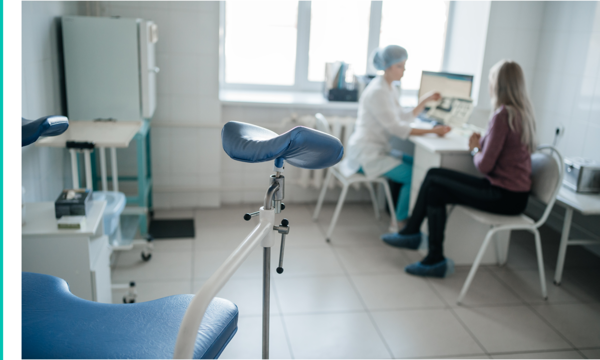 Woman doctor gynecologist consulting a patient at the reception