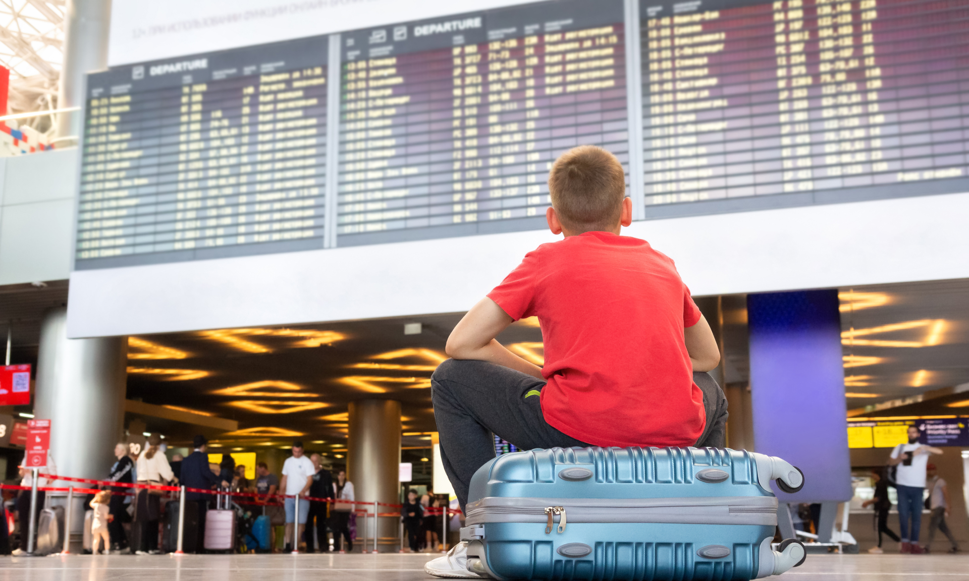 A child sitting at the airpot