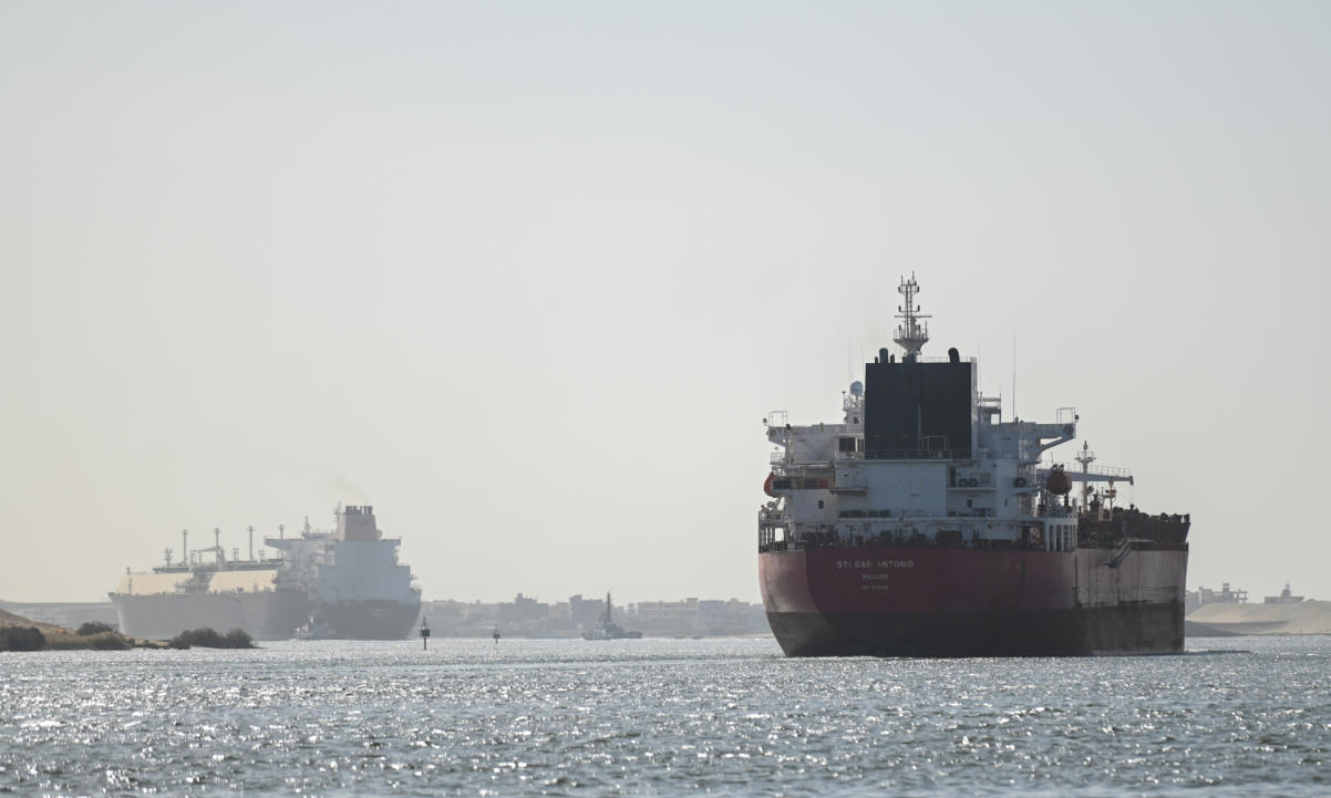 A ship transits the Suez Canal towards the Red Sea