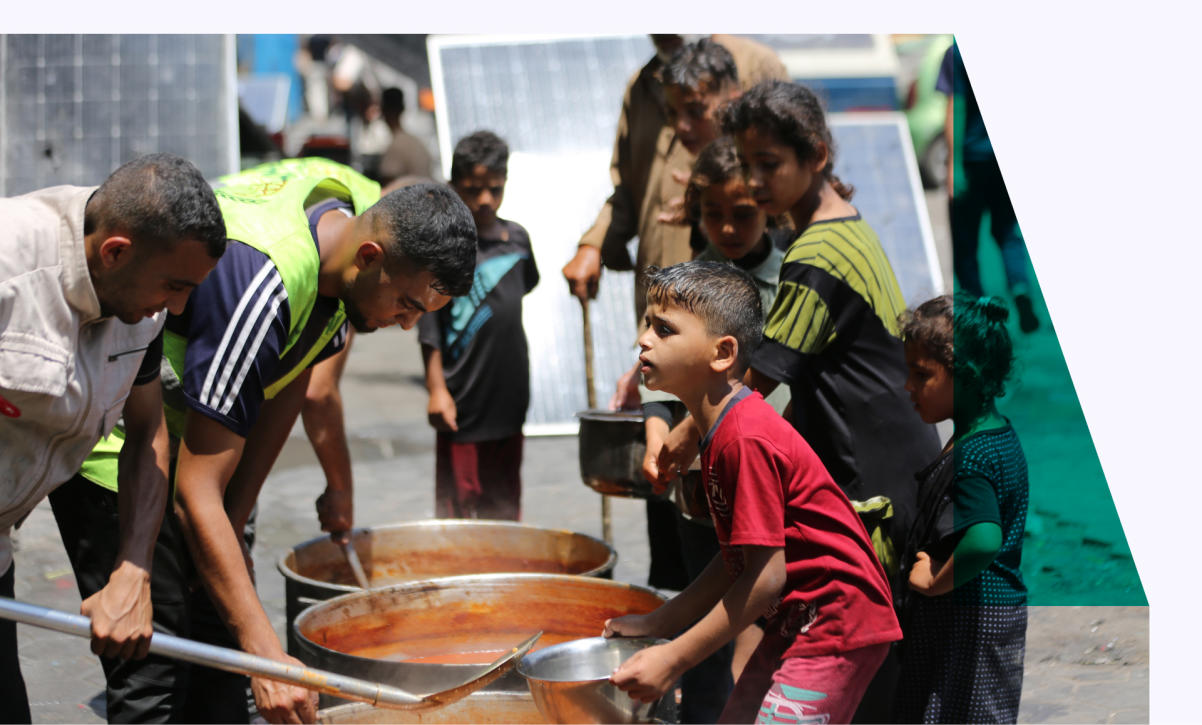 Children in line for food in Gaza