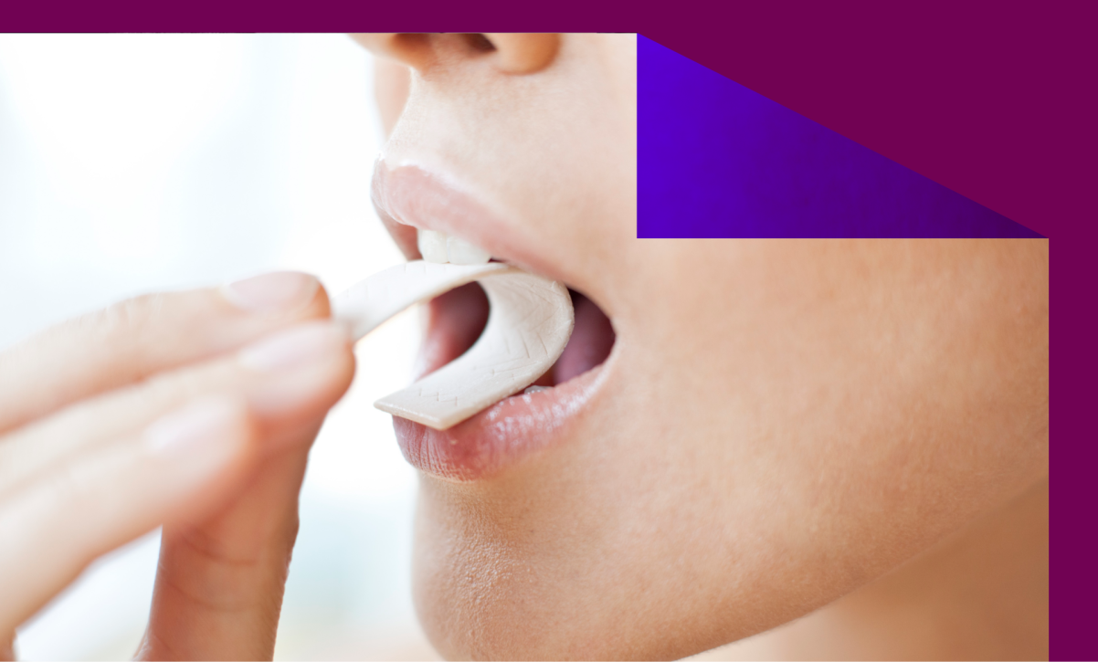 A woman chewing a piece of gum